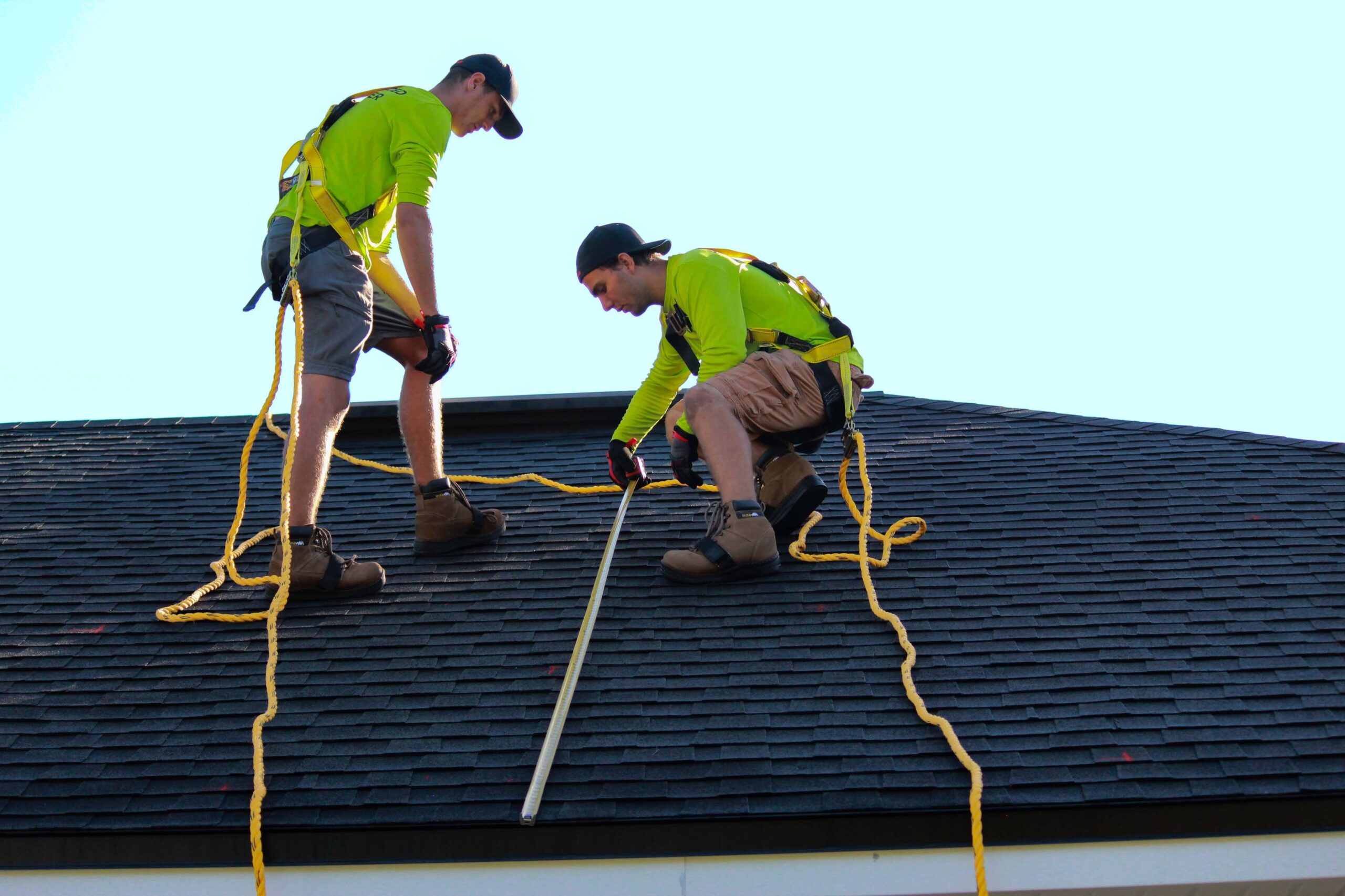 engineers measuring roof